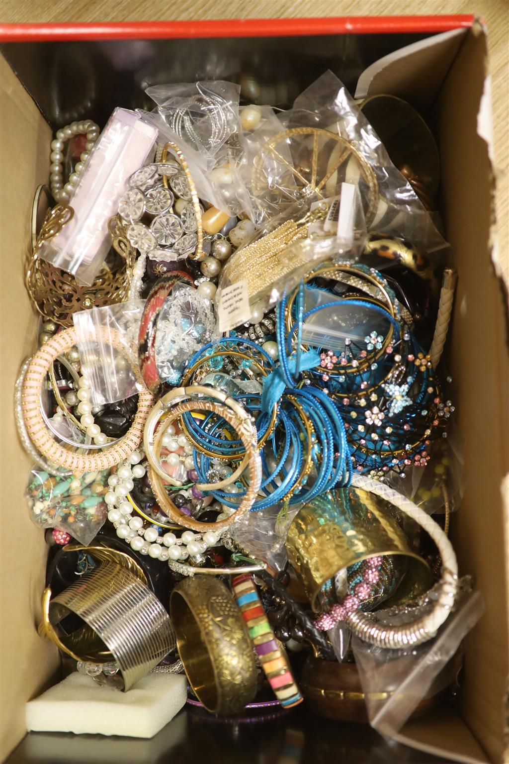 A large quantity of assorted costume jewellery.